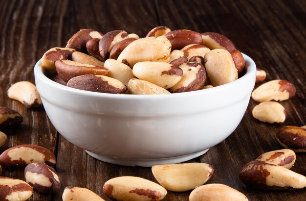 Brazil nuts on wooden background