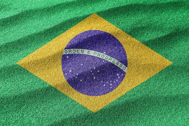 Brazil sand flag, national flag sand background