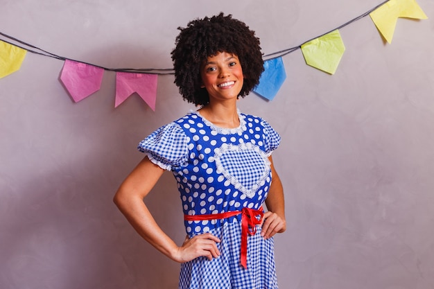 Brazilian afro woman wearing typical clothes for the Festa Junina