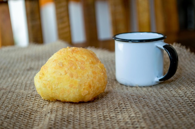 Brazilian cheese bread with coffee mug