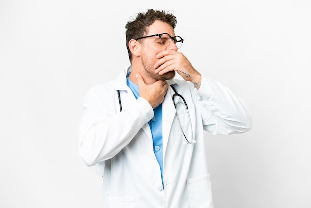 Brazilian doctor man over isolated white background is suffering with cough and feeling bad