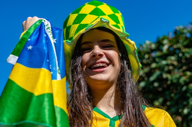 Brazilian fan celebrating and cheering for the Brazil national team at the World Cup