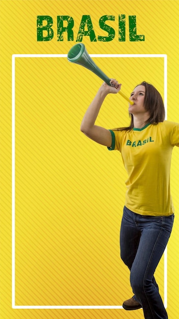 Brazilian fan woman celebrating on a yellow background