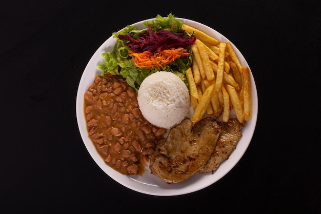 Brazilian food dish on a photographic background