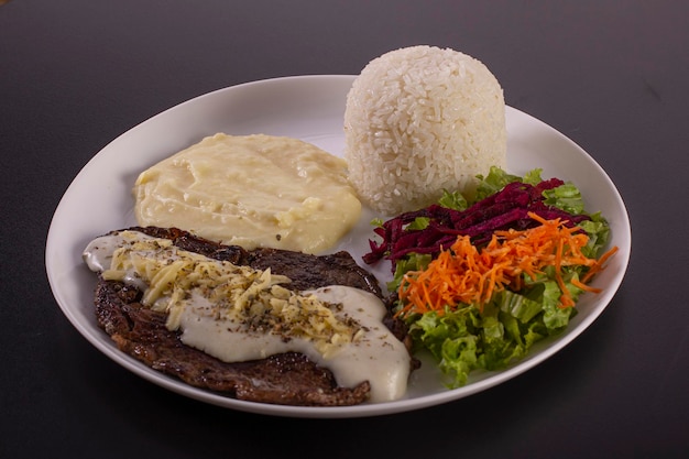 Brazilian food dish on a photographic background