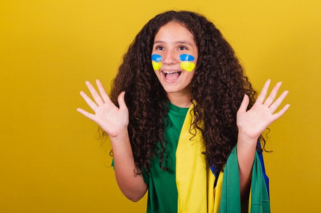 Brazilian girl Caucasian soccer fan surprised happy joyful