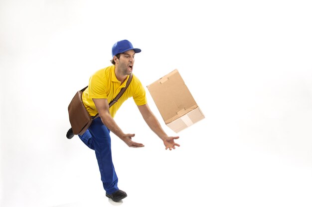 Brazilian mailman dropping a package