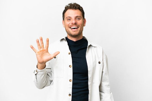 Brazilian man over isolated white background counting five with fingers