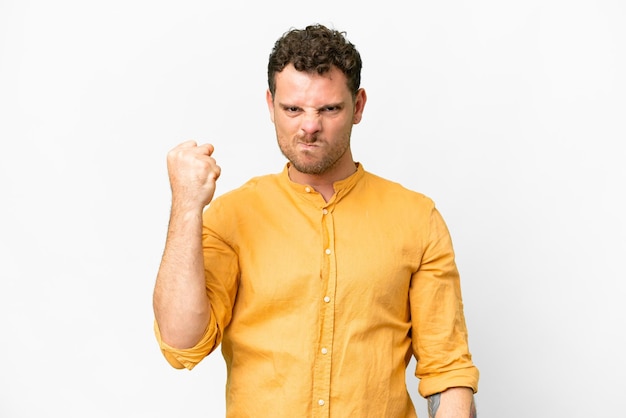 Brazilian man over isolated white background with unhappy expression