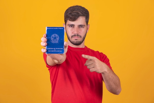 Brazilian man with document work and social security carteira de trabalho e previdencia social