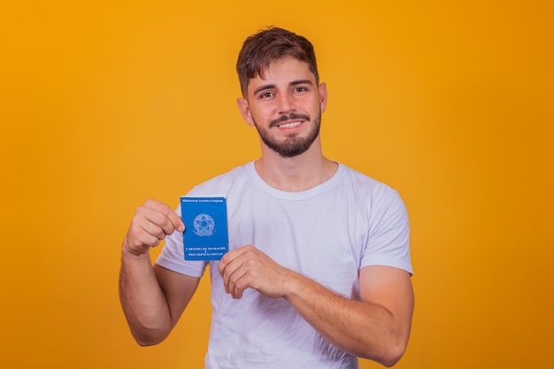 Brazilian man with document work and social security, (carteira de trabalho e previdencia social)