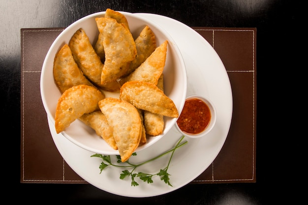 Brazilian meat pastries with cheese