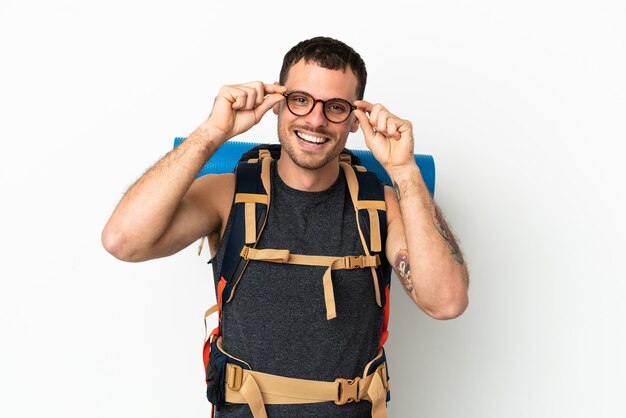 Brazilian mountaineer man with a big backpack