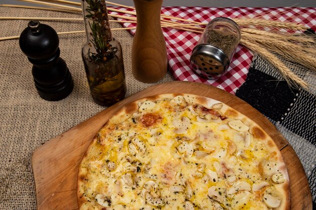 Brazilian mushroom cheese and oregano pizza top view