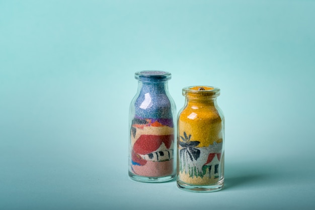 brazilian northeast handmade souvenir small bottle with drawings made with colored sand