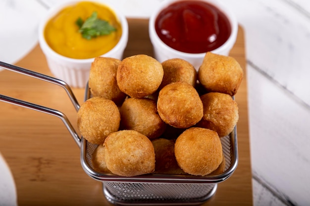 Photo brazilian snacks stuffed fried balls