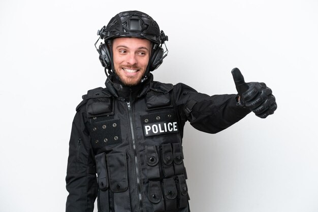 Brazilian soldier man isolated on white background giving a thumbs up gesture