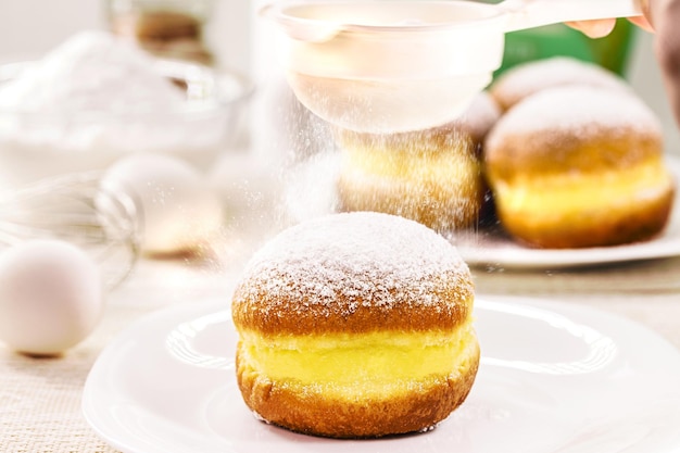 Brazilian sweet called bakery quotdreamquot or in Germany for Berliner donuts Berliner Ballen Berliner Eierlikor or KreppelEierlikor