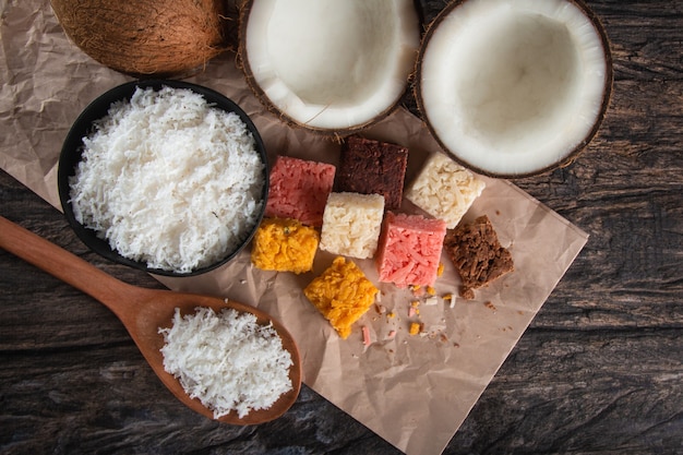 Brazilian sweet coconut candy on rustic wood