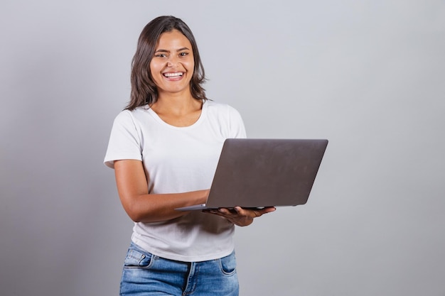 Brazilian woman holding notebook Connected internet web developer