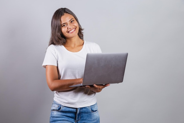 Brazilian woman holding notebook Connected internet web developer