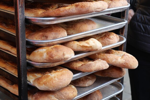 Bread baguettes in a basket in the baking shop