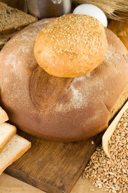 Bread and bakery products on wood background