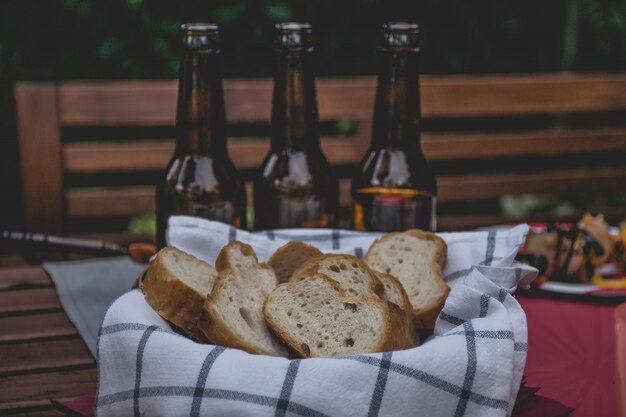 Bread in basket place on the table for partying or picnic.