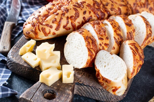 Bread and cheese sticks on a dark blue background