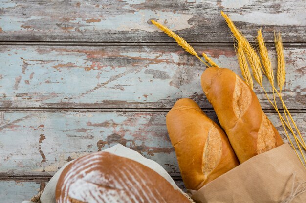 Bread loaves on wooden table