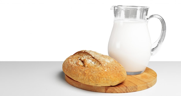 Bread and milk on the table