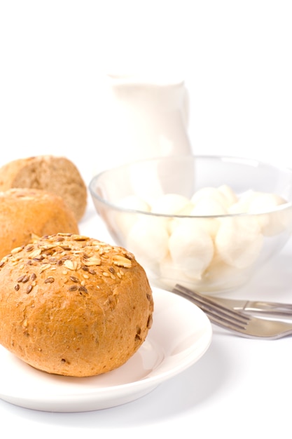 Bread and mozzarella closeup on white