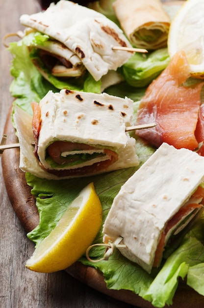 Bread rolls with salmon and salad