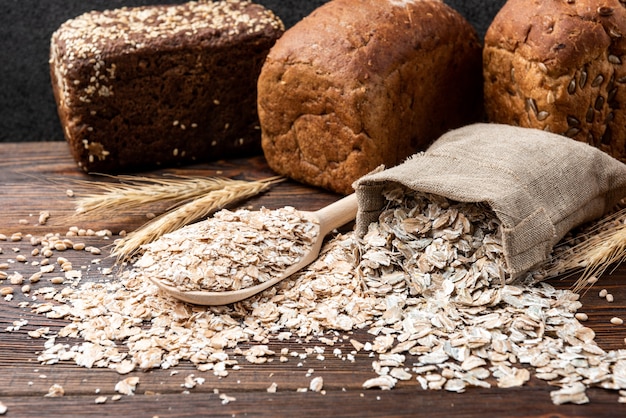 Bread and rye flakes on table