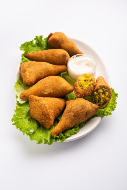 Bread samosa is a variation of regular samosa with same potato peas filling using sandwich bread slices for the outer covering