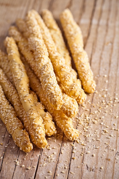 Bread sticks grissini with sesame seeds