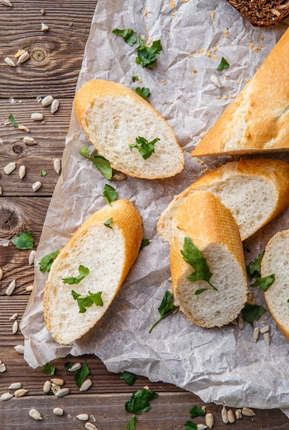 Bread on table with herbs