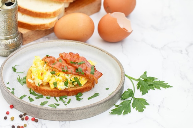 Bread toast with scrambled eggs