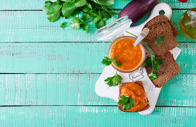 Bread toasts with eggplant caviar. Vegan meal. Healthy vegetarian food