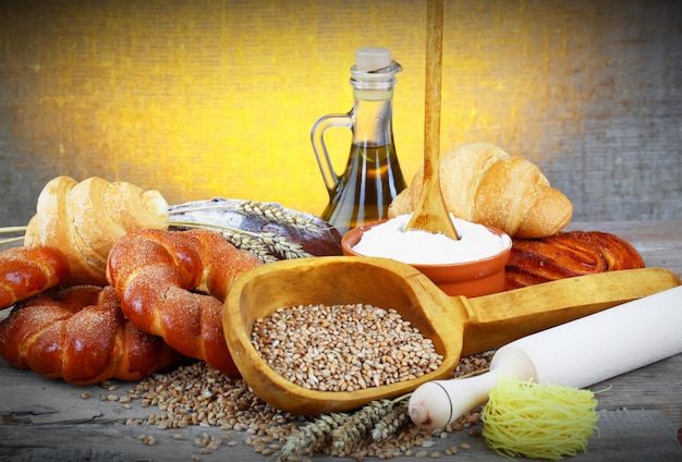 Bread and wheat on a wooden table