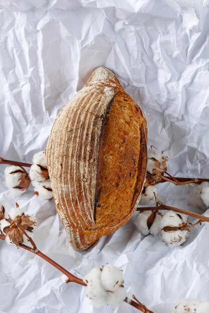 Bread on white crumpled paper