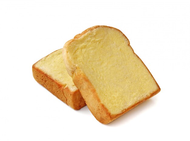 Bread with butter isolated on white wall