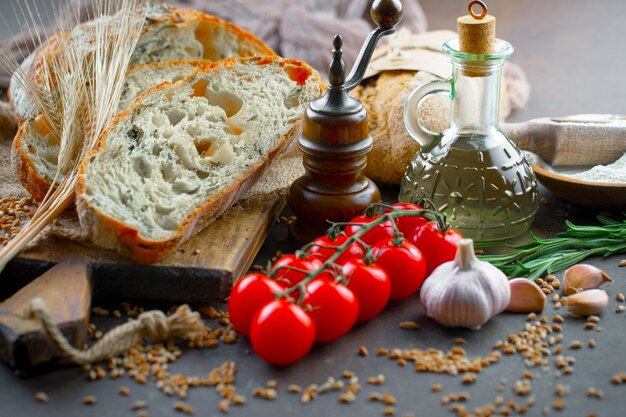 Bread with kitchen accessories on the table