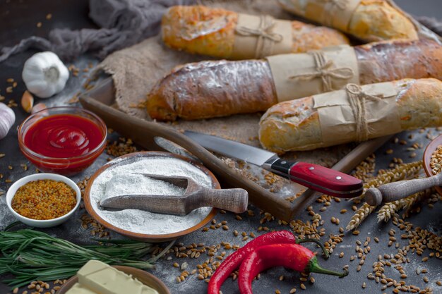 Bread with kitchen accessories on the table