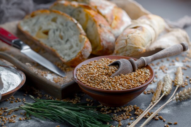 Bread with kitchen accessories on the table