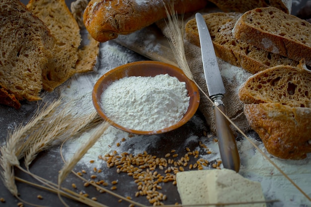 Bread with kitchen accessories on the table