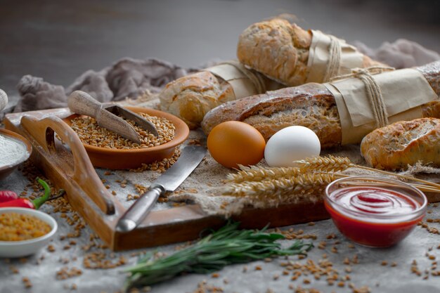 Bread with kitchen accessories on the table