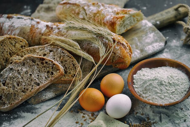 Bread with kitchen accessories on the table