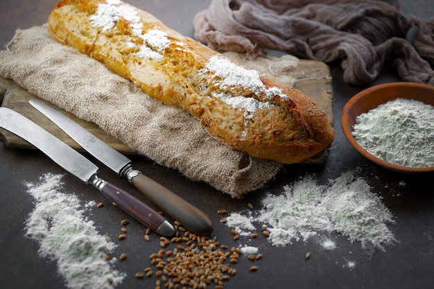 Bread with kitchen accessories on the table