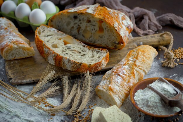 Bread with kitchen accessories on the table